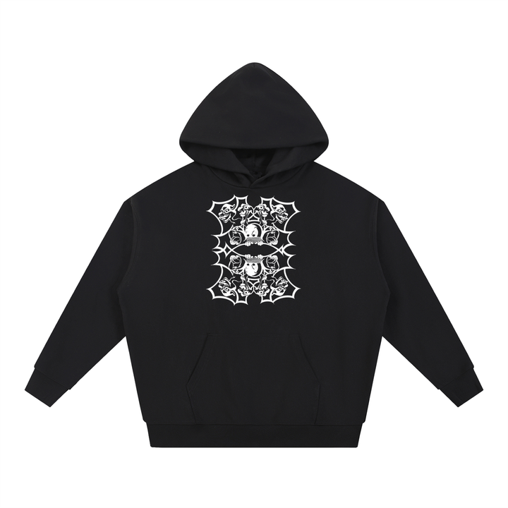 A black pullover hoodie with a white graphic print on the chest featuring stacked skulls inside a gothic spiderweb design, displayed on a solid white background.