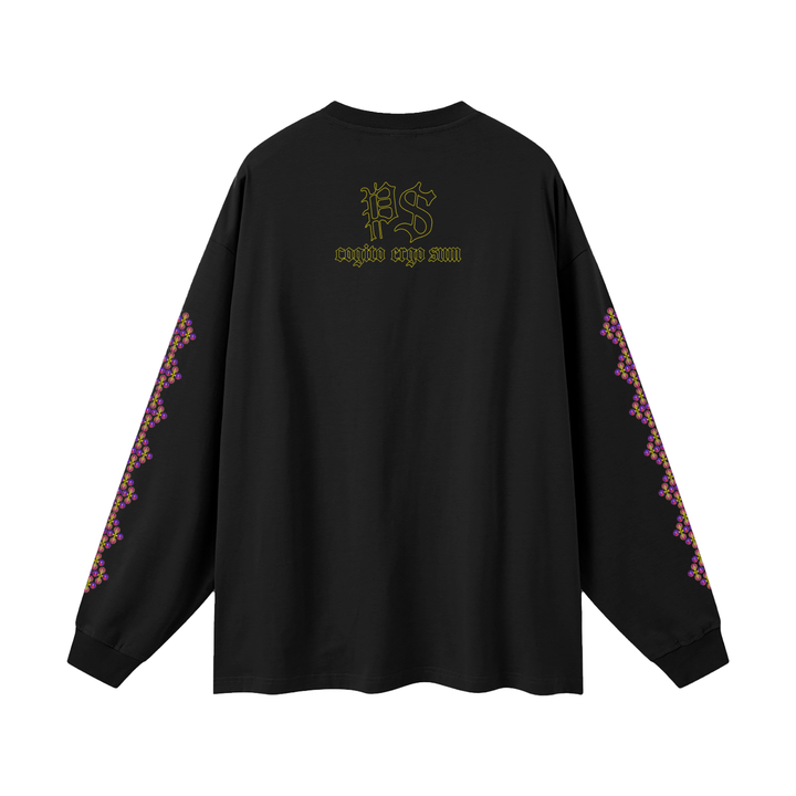 black longsleeve with colorful grapics along the sides of the shirt